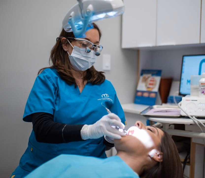 Patient receiving a dental checkup at Meadowbrook Dental