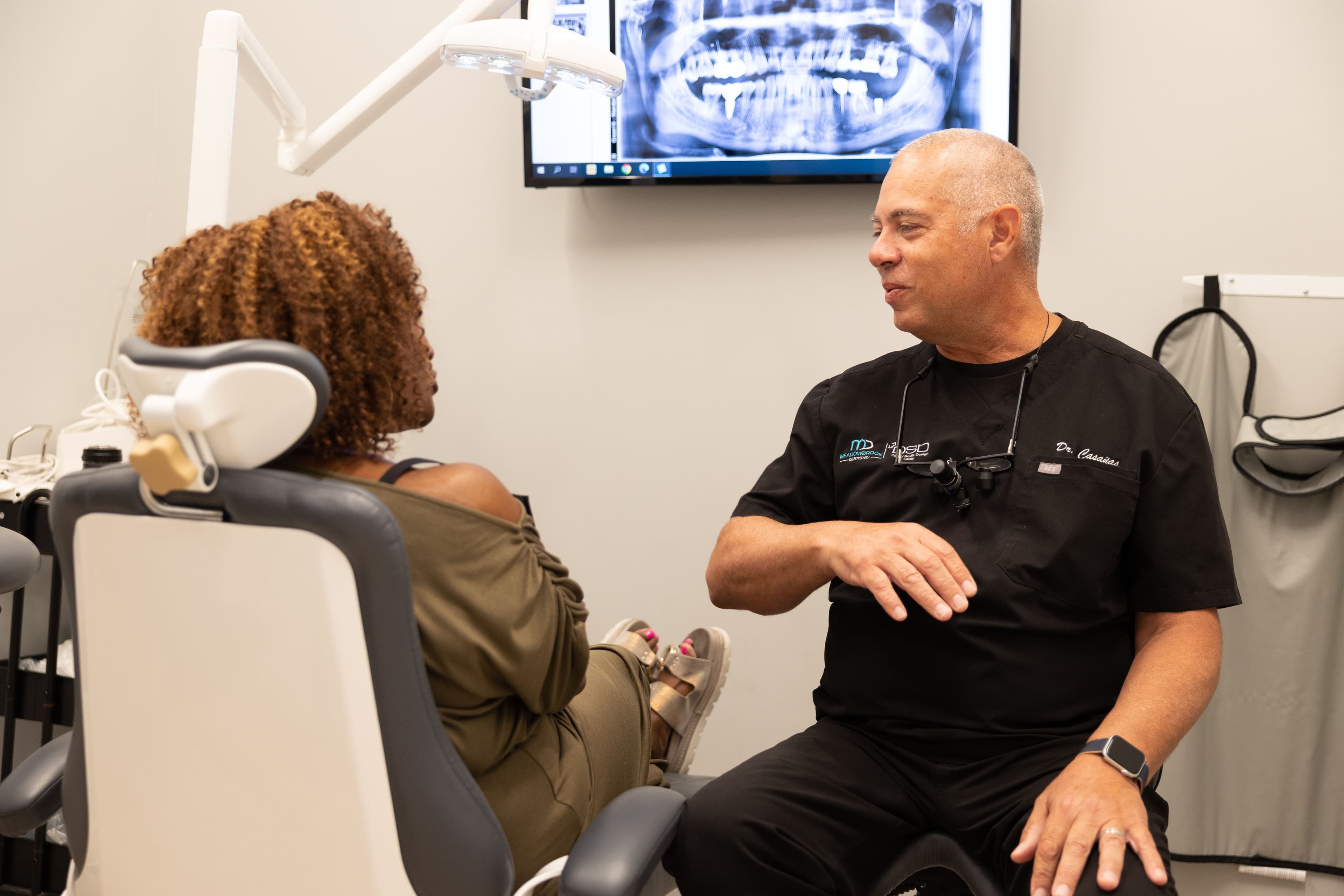 Patient and dentist during a general dentistry visit at Meadowbrook Dental